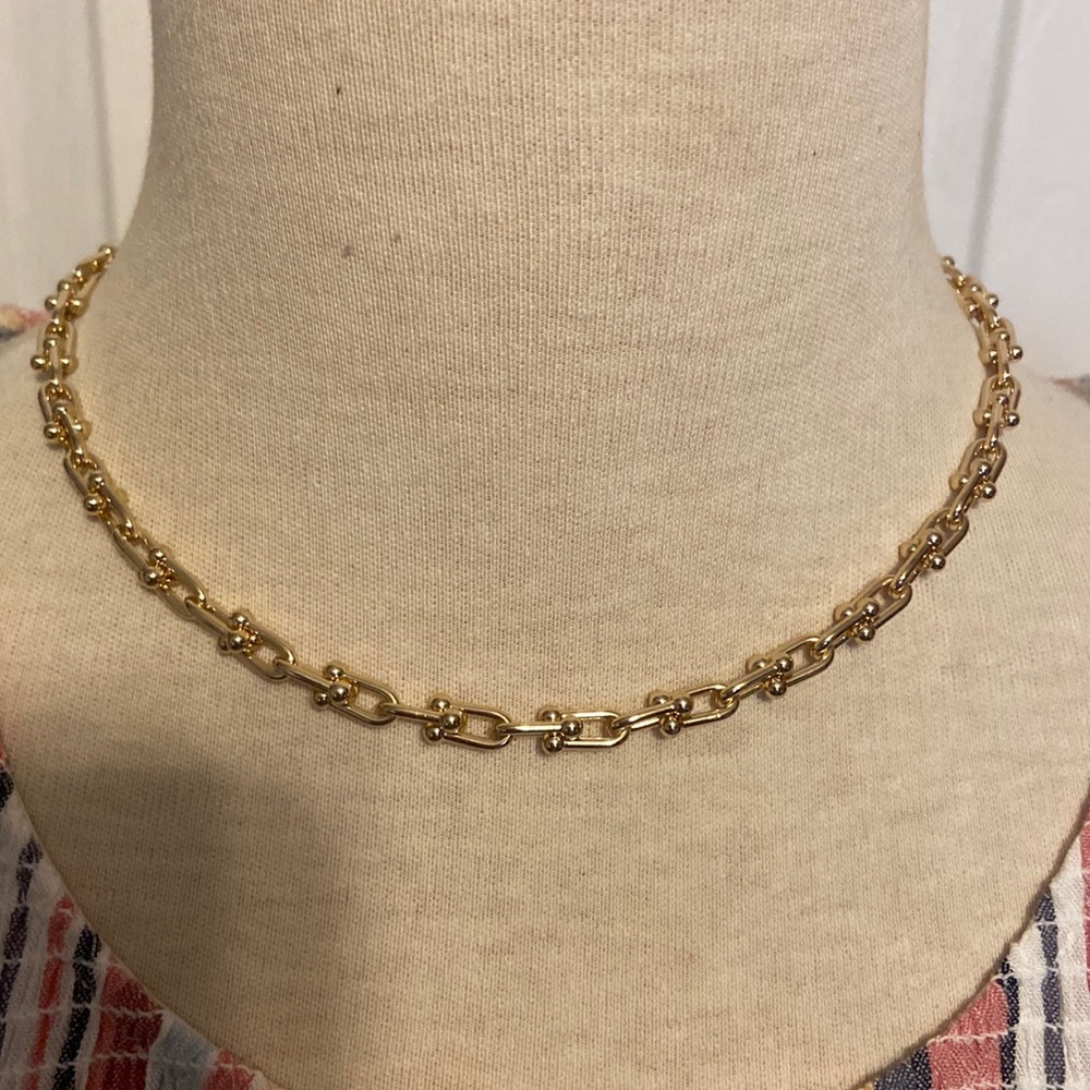 Gold tone chain link necklace